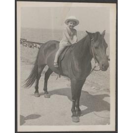 Unidentified child on horse