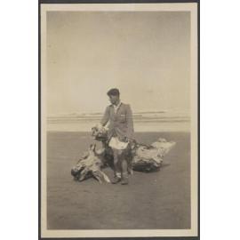 [James Bertram] standing on a beach