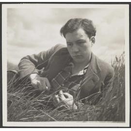 Unidentified man in grass