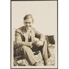 Unidentified man on a pebble beach in Hove