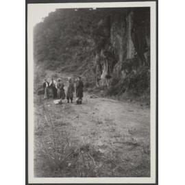 Group of people on a dirt road