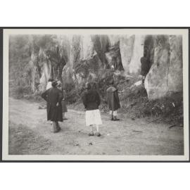 Group of people on a dirt road
