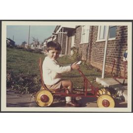 Jeremy Railton on a toy car