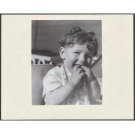Christmas card with a photograph of a child on the front