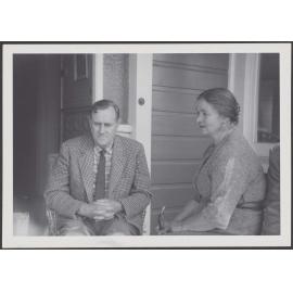 Patrick White and Peggy Garland on a porch