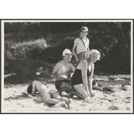 Jack and Gwyneth Bennett with two boys on a beach