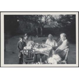 Bennett family around a table outside