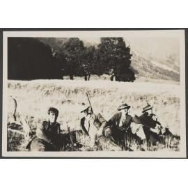 'Four men in mountains'