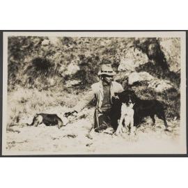 Man with two dogs
