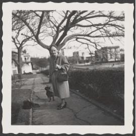 Ethel Englefield on the street with a dog