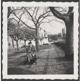 Ethel Englefield on the street with a dog