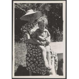 Woman with little boy on lap