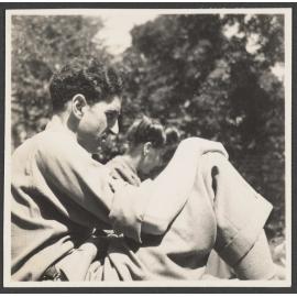 Charles Brasch and a woman in the garden