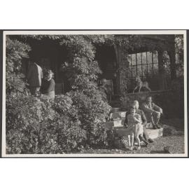 Group of people on porch and steps