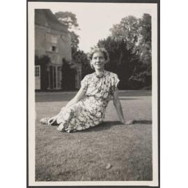 Woman sitting on grass