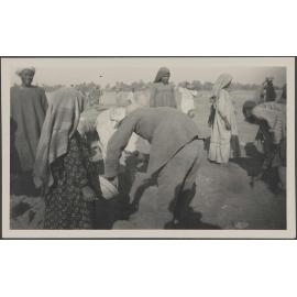 'Hassan Khalil (left) Tubai's back. 1933-4'