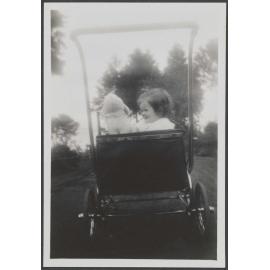 Unidentified girl in pram