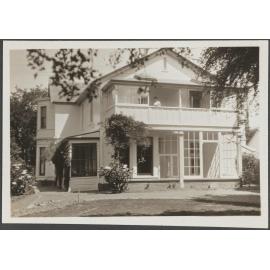 Bankton with unidentified person on balcony