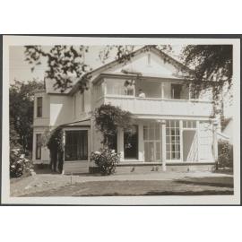 Bankton with unidentified person on balcony