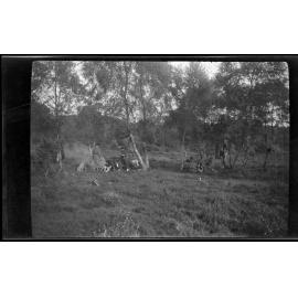 Groups of young women under trees [Girl Guides]