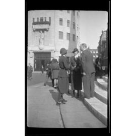 People including Girl Guides beside the steps of All Souls' Church, Langham Place, London