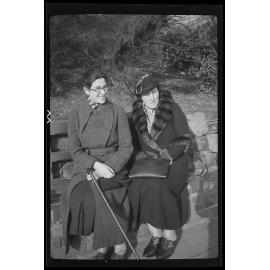 Lesley Brasch and an unidentified older woman sitting on a bench