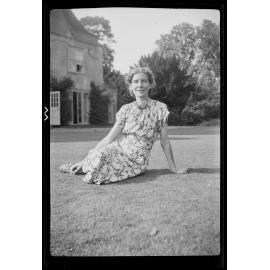 Woman sitting on grass