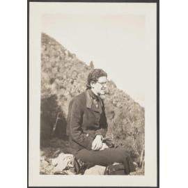 Lesley Brasch outside with a camera in hand