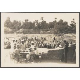 Workers waiting for their pay to be dealt out