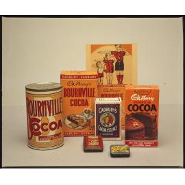 Cocoa tins, boxes, and point-of-sale card