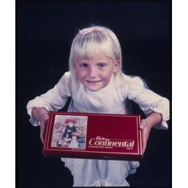 Girl with Cadbury Continental box