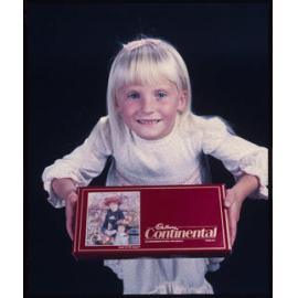 Girl with Cadbury Continental box