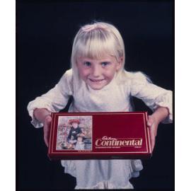 Girl with Cadbury Continental box