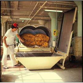 Cadbury machinery operator with Chocolate Chippie mixture