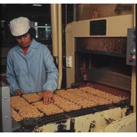 Machinery operator with Cadbury Picnic bars