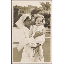 Young Jeremy Stamers-Smith with a nurse