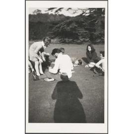 Pupils at Abbey School sitting on the grass