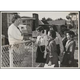 Guides and Brownies selling Girl Guide biscuits