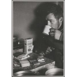 Man with cocoa and chocolate