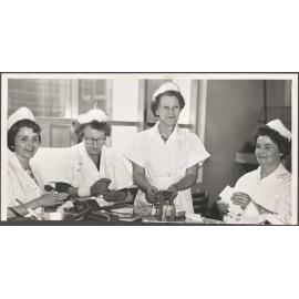 Mavis Welsford (Boxroom Forewoman) with three other women