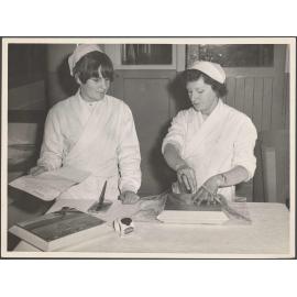 Packing a box of Continental chocolates