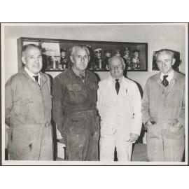 Jim Moffat, Jim Wilson, Ernie Gilchrist and Charlie McLean in the Chairman's Office on the eve of their retirement