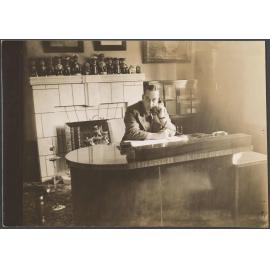 Carl Smith, Managing Director of Cadbury Fry Hudson, at his desk