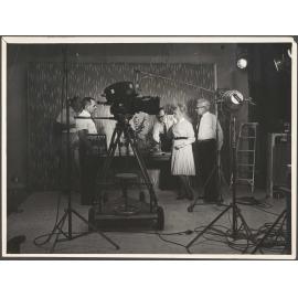 'In a T.V. Production Studio in Auckland during production of commercials for Hudson's biscuits'