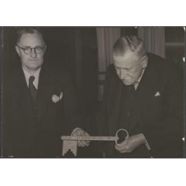 R.J.D. Hudson handing Richard Hudson Senior the 'key' of the C.F.H. Miniature Rifle Club