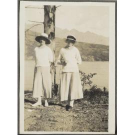 Two unidentified women wearing hats