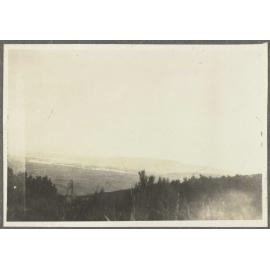 Grassy hills overlooking plain