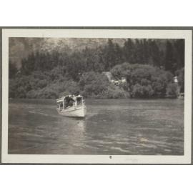 Boat sailing on lake