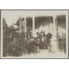Unidentified woman and two children