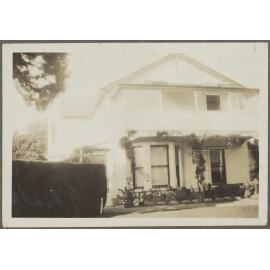 House with vines on porch